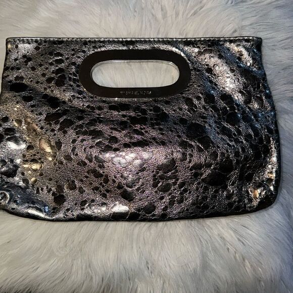 Micheal Kors metallic clutch - Picture 1 of 4
